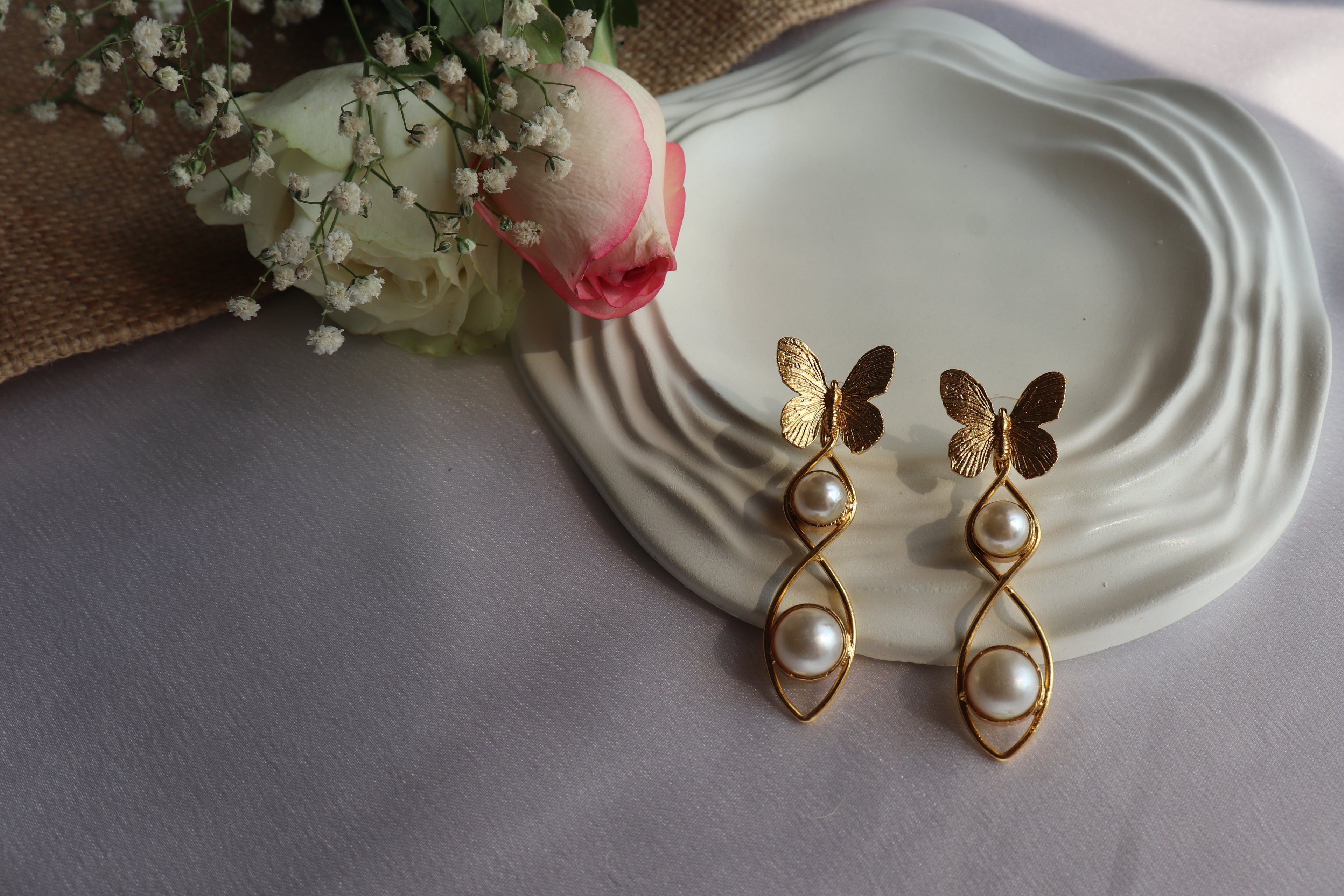 Butterfly pearls drops